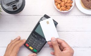 What are the implications of a cashless society?